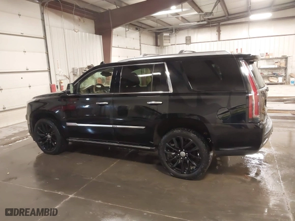 2015 Cadillac Escalade Platinum with VIN 1GYS4PKJ9FR745825, listed as a IAAI auction lot 41201715 with 133,363 mi miles. Bid and sale history available at carsss.com. Image 15.
