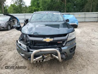2015 Chevrolet Colorado 2WD Z71 with VIN 1GCGSCE30F1146978, listed as a Copart auction lot 56800985 with 201,186 mi miles and Salvage title. Bid and sale history available at DreamBid. Image 5.