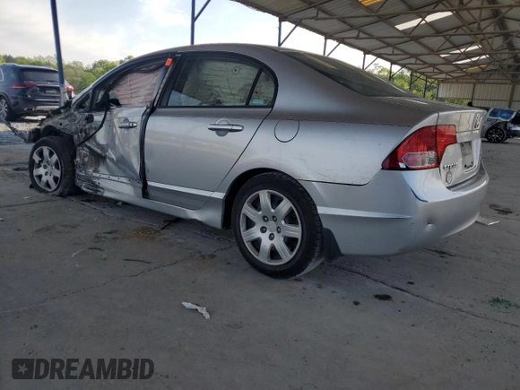 2006 Honda Civic LX with VIN 1HGFA16506L065908, listed as a Copart auction lot 51797795 with 87,456 mi miles and Salvage Title. Bid and sale history available at DreamBid. Image 2.
