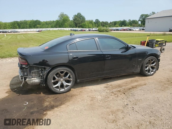 2016 Dodge Charger R/T with VIN 2C3CDXCT4GH303356, listed as a Copart auction lot 59140015 with 128,049 mi miles and Salvage title. Bid and sale history available at DreamBid. Image 3.
