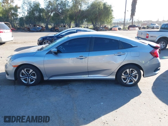 2016 Honda Civic Sedan LX with VIN 19XFC2F50GE027409, listed as a IAAI auction lot 41678211 with 116,498 mi miles. Bid and sale history available at carsss.com. Image 14.