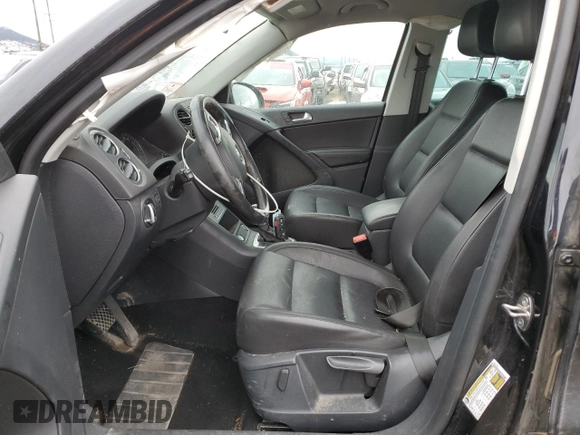 2014 Volkswagen Tiguan SEL with VIN WVGBV3AX2EW596929, listed as a Copart auction lot 46267875 with Not provided miles and Salvage title. Bid and sale history available at DreamBid. Image 7.