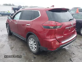 2018 Nissan Rogue SV with VIN 5N1AT2MT7JC810880, listed as a IAAI auction lot 41084997 with 98,719 mi miles and . Bid and sale history available at carsss.com. Image 3.