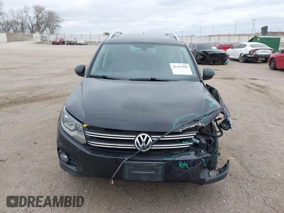2016 Volkswagen Tiguan S with VIN WVGBV7AX9GW566451, listed as a IAAI auction lot 41393999 with 51,616 mi miles and . Bid and sale history available at DreamBid. Image 13.