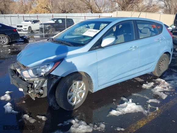 2014 Hyundai Accent GS with VIN KMHCT5AE8EU145312, listed as a IAAI auction lot 41021429 with 70,835 mi miles. Bid and sale history available at carsss.com. Image 2.