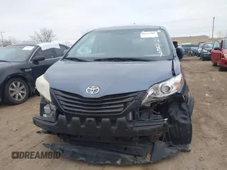 2015 Toyota Sienna L with VIN 5TDZK3DC6FS542457, listed as a IAAI auction lot 41072508 with 167,509 mi miles and . Bid and sale history available at DreamBid. Image 6.