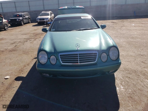 1999 Mercedes-Benz CLK-Class with VIN WDBLJ65G4XF071095, listed as a Copart auction lot 72080064 with 97,558 mi miles and Salvage Title. Bid and sale history available at carsss.com. Image 5.