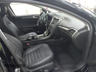 2016 Ford Fusion SE z VIN 3FA6P0T98GR111895, wystawiony jako IAAI lot #42633525 z przebiegiem 77 231 mil mil oraz . Historia ofert i sprzedaży dostępna na DreamBid. Obrazek 5.