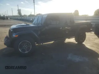 2023 Jeep Gladiator Rubicon with VIN 1C6JJTBG0PL503198, listed as a Copart auction lot 87654375 with 0 mi miles and Salvage Title. Bid and sale history available at carsss.com. Image 1.