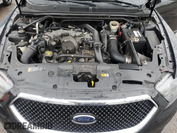 2013 Ford Taurus SHO z VIN 1FAHP2KT9DG155683, wystawiony jako Copart lot #55686075 z przebiegiem 180 283 mil mil oraz Czysty tytuł • Clean title. Historia ofert i sprzedaży dostępna na DreamBid. Obrazek 11.