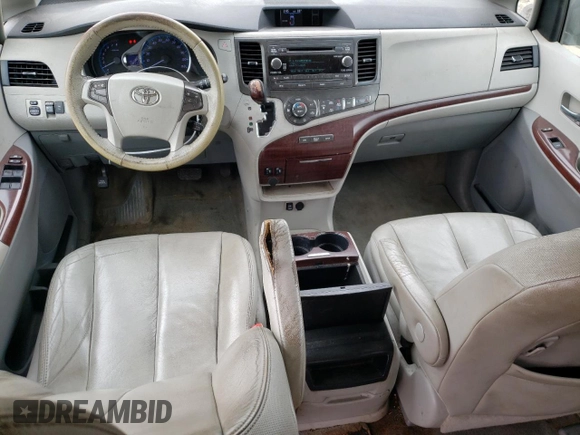 2012 Toyota Sienna XLE AAS with VIN 5TDYK3DC7CS216061, listed as a Copart auction lot 60596715 with 112,713 mi miles and Salvage title. Bid and sale history available at DreamBid. Image 8.