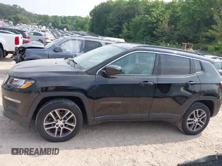2017 Jeep Compass Latitude with VIN 3C4NJDBBXHT616909, listed as a IAAI auction lot 42457501 with 110,326 mi miles and . Bid and sale history available at DreamBid. Image 14.