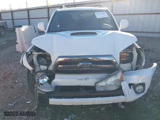 2006 Toyota 4Runner SR5 with VIN JTEBU14R560098877, listed as a IAAI auction lot 41722880 with 212,357 mi miles. Bid and sale history available at carsss.com. Image 6.