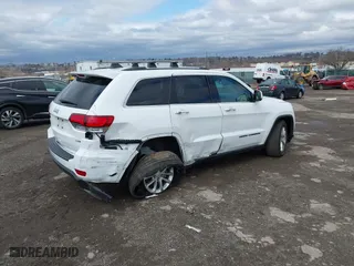 2021 Jeep Grand Cherokee Laredo X with VIN 1C4RJEAG3MC712147, listed as a IAAI auction lot 41807677 with 79,455 mi miles. Bid and sale history available at carsss.com. Image 4.