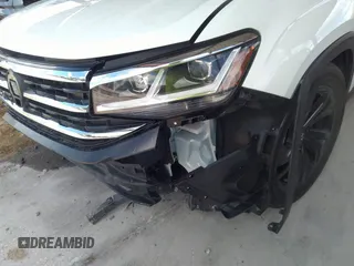 2022 Volkswagen Atlas SE z VIN 1V2WR2CA6NC544975, wystawiony jako IAAI lot #39643571 z przebiegiem 42 210 mil mil oraz . Historia ofert i sprzedaży dostępna na DreamBid. Obrazek 18.