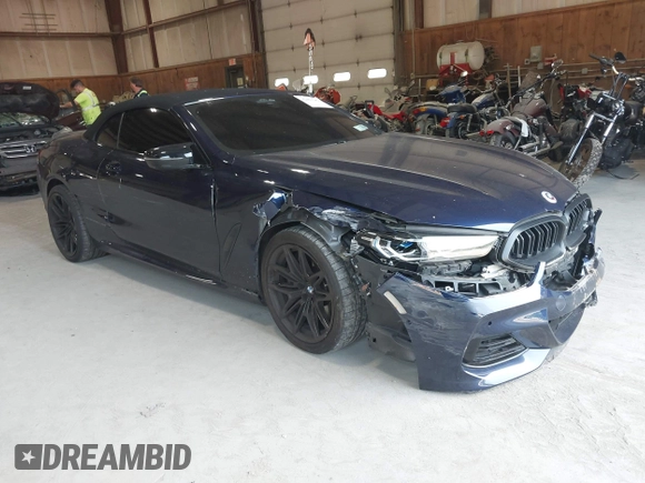 2023 BMW 8 Series with VIN WBAFY4C07PCM50546, listed as a IAAI auction lot 42403241 with 15,697 mi miles and . Bid and sale history available at DreamBid. Image 1.