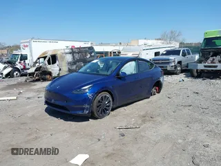 2023 Tesla Model Y Performance z VIN 7SAYGDEF4PF844933, wystawiony jako IAAI lot #42048999 z przebiegiem Nie podano mil oraz . Historia ofert i sprzedaży dostępna na DreamBid. Obrazek 16.