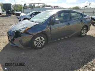 2018 Toyota Prius Two z VIN JTDKBRFU8J3079094, wystawiony jako Copart lot #56120865 z przebiegiem 63 779 mil mil oraz Szkoda całkowita • Salvage title. Historia ofert i sprzedaży dostępna na DreamBid. Obrazek 1.