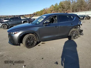 2022 Mazda CX-5 2.5 Turbo with VIN JM3KFBAY2N0596945, listed as a Copart auction lot 86427694 with Not Provided miles and Salvage Title. Bid and sale history available at carsss.com. Image 1.