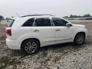 2013 Kia Sorento SX z VIN 5XYKWDA20DG412272, wystawiony jako Copart lot #60263145 z przebiegiem Nie podano mil oraz Czysty tytuł • Clean title. Historia ofert i sprzedaży dostępna na DreamBid. Obrazek 3.