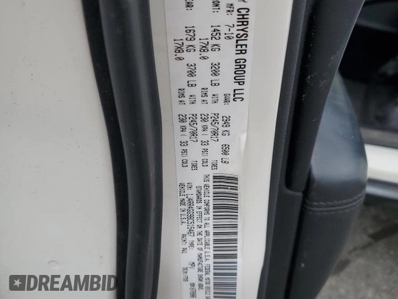 2011 Jeep Grand Cherokee Laredo with VIN 1J4RR4GG9BC515467, listed as a Copart auction lot 58411085 with 112,558 mi miles and Salvage title. Bid and sale history available at DreamBid. Image 13.