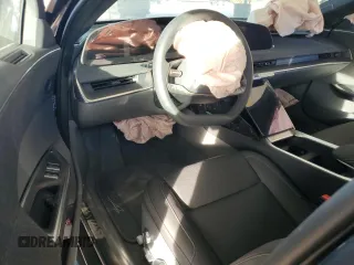 2024 Lucid Air Pure z VIN 50EA1PGA7RA001741, wystawiony jako Copart lot #79933954 z przebiegiem Nie podano mil oraz Szkoda całkowita • Salvage title. Historia ofert i sprzedaży dostępna na DreamBid. Obrazek 8.