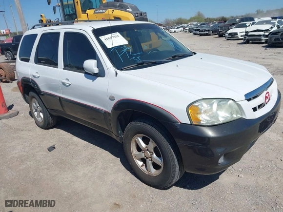 2006 Mazda Tribute i with VIN 4F2YZ02Z06KM26613, listed as a IAAI auction lot 41847931 with 145,164 mi miles. Bid and sale history available at carsss.com. Image 1.