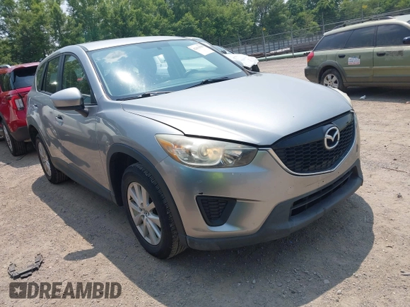 2014 Mazda CX-5 Sport with VIN JM3KE4BE9E0411177, listed as a IAAI auction lot 42411938 with 167,709 mi miles and . Bid and sale history available at DreamBid. Image 1.