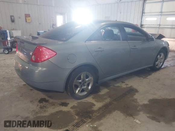 2009 Pontiac G6 1SB with VIN 1G2ZJ57B894237824, listed as a IAAI auction lot 41731113 with 144,914 mi miles and . Bid and sale history available at DreamBid. Image 4.