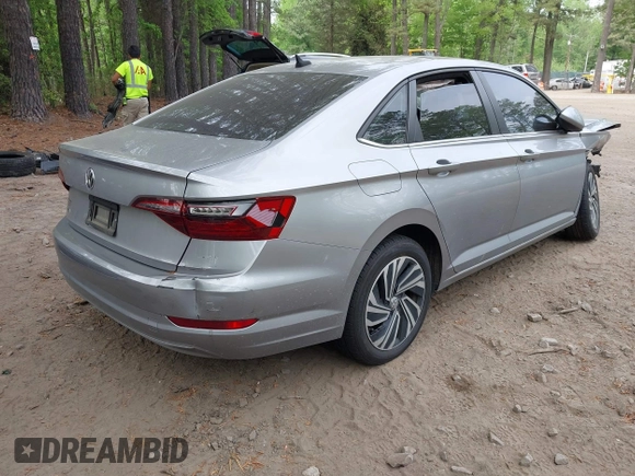 2020 Volkswagen Jetta SEL z VIN 3VWE57BU9LM082552, wystawiony jako IAAI lot #42091492 z przebiegiem 60 775 mil mil oraz . Historia ofert i sprzedaży dostępna na DreamBid. Obrazek 4.