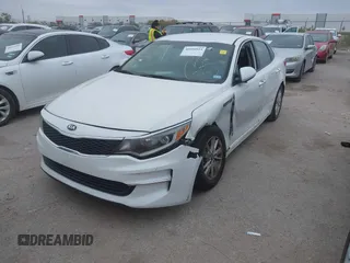 2016 Kia Optima LX with VIN KNAGT4L39G5104726, listed as a IAAI auction lot 40950914 with 128,728 mi miles. Bid and sale history available at carsss.com. Image 17.