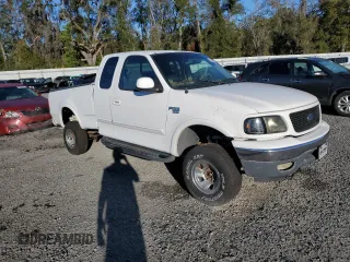 1999 Ford F-150 with VIN 2FTRX18W4XCA10583, listed as a Copart auction lot 44982655 with Not provided miles and Salvage title. Bid and sale history available at DreamBid. Image 4.