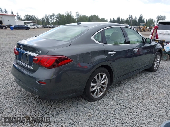 2015 Infiniti Q70 with VIN JN1BY1ARXFM562111, listed as a IAAI auction lot 42473521 with 123,212 mi miles and . Bid and sale history available at DreamBid. Image 4.