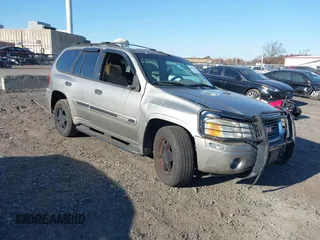 2002 GMC Envoy SLT with VIN 1GKDT13S822304832, listed as a IAAI auction lot 40874054 with 132,883 mi miles. Bid and sale history available at carsss.com. Image 1.