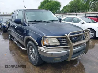 2003 Ford F-150 XLT with VIN 1FTRW07L33KC83234, listed as a IAAI auction lot 41894573 with 215,232 mi miles. Bid and sale history available at carsss.com. Image 1.