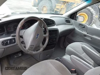 2002 Ford Windstar SE with VIN 2FMZA52402BA76283, listed as a IAAI auction lot 41512294 with 113,626 mi miles and . Bid and sale history available at DreamBid. Image 5.