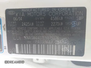 2014 Kia Optima Hybrid LX with VIN KNAGM4AD7E5075376, listed as a IAAI auction lot 42179468 with 131,920 mi miles. Bid and sale history available at carsss.com. Image 9.