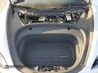 2021 Tesla Model 3 Standard Range Plus z VIN 5YJ3E1EA5MF018216, wystawiony jako Copart lot #52007385 z przebiegiem 49 711 mil mil oraz Szkoda całkowita • Salvage title. Historia ofert i sprzedaży dostępna na DreamBid. Obrazek 13.
