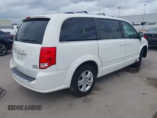2011 Dodge Grand Caravan Crew with VIN 2D4RN5DGXBR786592, listed as a IAAI auction lot 42114198 with 243,423 mi miles and . Bid and sale history available at DreamBid. Image 4.