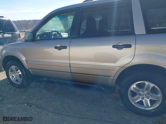 2004 Honda Pilot EX with VIN 2HKYF18574H578967, listed as a IAAI auction lot 41622715 with 150,803 mi miles. Bid and sale history available at carsss.com. Image 14.