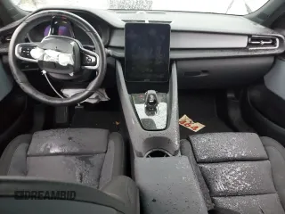2024 Polestar 2 z VIN YSMFD3KA5RL217212, wystawiony jako Copart lot #85276194 z przebiegiem Nie podano mil oraz Nie do naprawy • Non repairable. Historia ofert i sprzedaży dostępna na DreamBid. Obrazek 8.