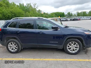 2016 Jeep Cherokee Latitude z VIN 1C4PJMCB2GW145287, wystawiony jako IAAI lot #42302969 z przebiegiem 124 974 mil mil oraz . Historia ofert i sprzedaży dostępna na DreamBid. Obrazek 13.