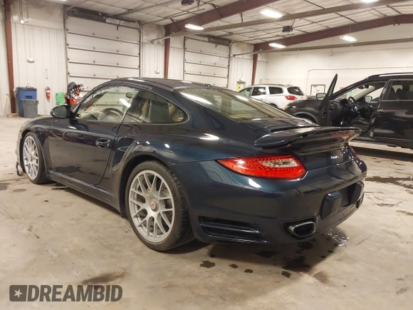 2011 Porsche 911 Turbo with VIN WP0AD2A93BS766801, listed as a IAAI auction lot 41566167 with 66,785 mi miles. Bid and sale history available at carsss.com. Image 3.