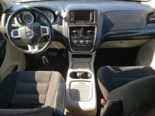 2014 Dodge Grand Caravan SXT z VIN 2C4RDGCG6ER427418, wystawiony jako Copart lot #58804395 z przebiegiem 154 524 mil mil oraz Tytuł czysty. Historia ofert i sprzedaży dostępna na DreamBid. Obrazek 8.