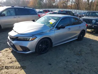2023 Honda Civic Sedan Sport with VIN 2HGFE2F52PH547613, listed as a IAAI auction lot 41129333 with 39,121 mi miles. Bid and sale history available at carsss.com. Image 2.