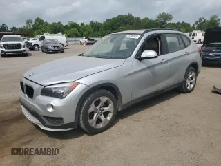 2015 BMW X1 sDrive28i with VIN WBAVM1C57FV314390, listed as a Copart auction lot 53706045 with 137,138 mi miles and Clean Title. Bid and sale history available at carsss.com. Image 1.