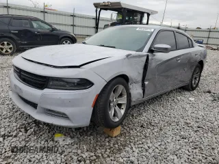 2015 Dodge Charger SXT with VIN 2C3CDXHG5FH824614, listed as a Copart auction lot 52808705 with 175,074 mi miles and Salvage title. Bid and sale history available at DreamBid. Image 1.