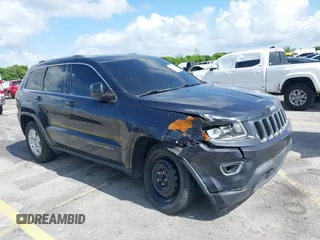 2014 Jeep Grand Cherokee Laredo with VIN 1C4RJEAG0EC179563, listed as a IAAI auction lot 39799427 with 209,169 mi miles and . Bid and sale history available at DreamBid. Image 1.