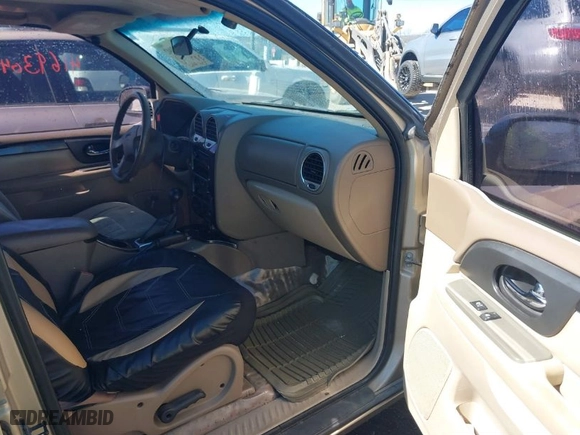 2004 GMC Envoy SLE with VIN 1GKDS13S442179334, listed as a IAAI auction lot 41693042 with 224,868 mi miles. Bid and sale history available at carsss.com. Image 5.
