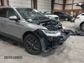 2024 Volkswagen Tiguan SE with VIN 3VVMB7AX8RM084483, listed as a IAAI auction lot 42452619 with 14,618 mi miles and . Bid and sale history available at DreamBid. Image 19.